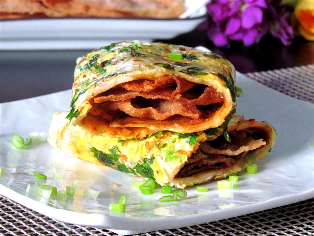 Jian Bing là một món ăn truyền thống của Trung Quốc Jian Bing là một món ăn truyền thống của Trung Quốc